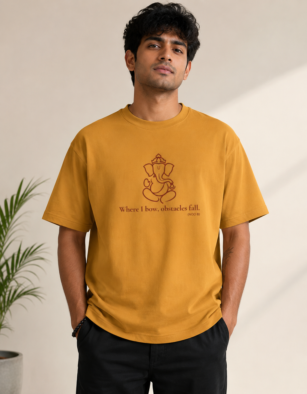 Golden yellow unisex cotton t-shirt with a red Lord Ganapati design by Vedic Bridge.