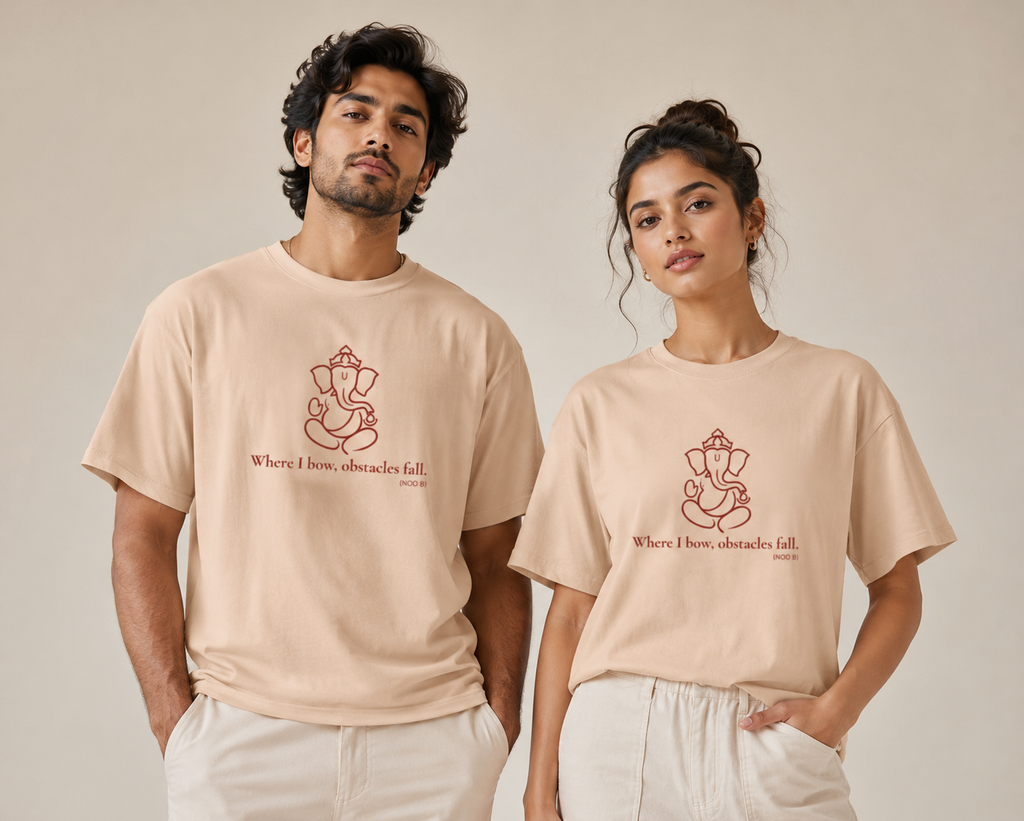Man and woman modelling in Peach unisex cotton t-shirts with a red Lord Ganapati design by Vedic Bridge.