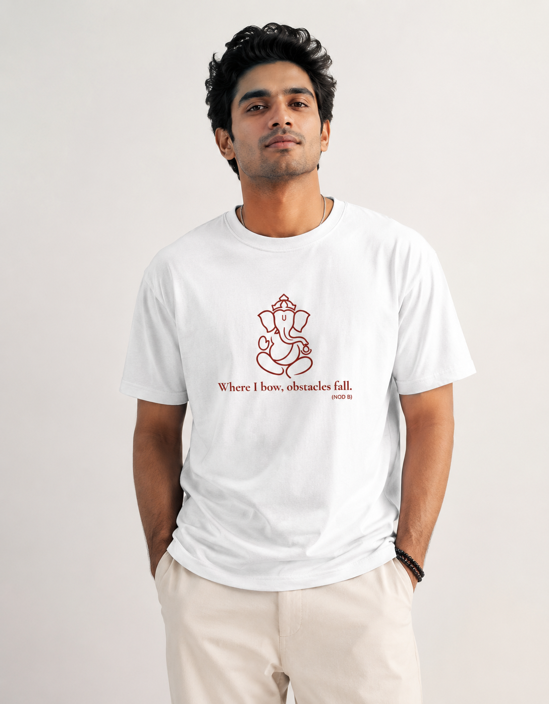 White unisex cotton t-shirt with a red Lord Ganapati design by Vedic Bridge.